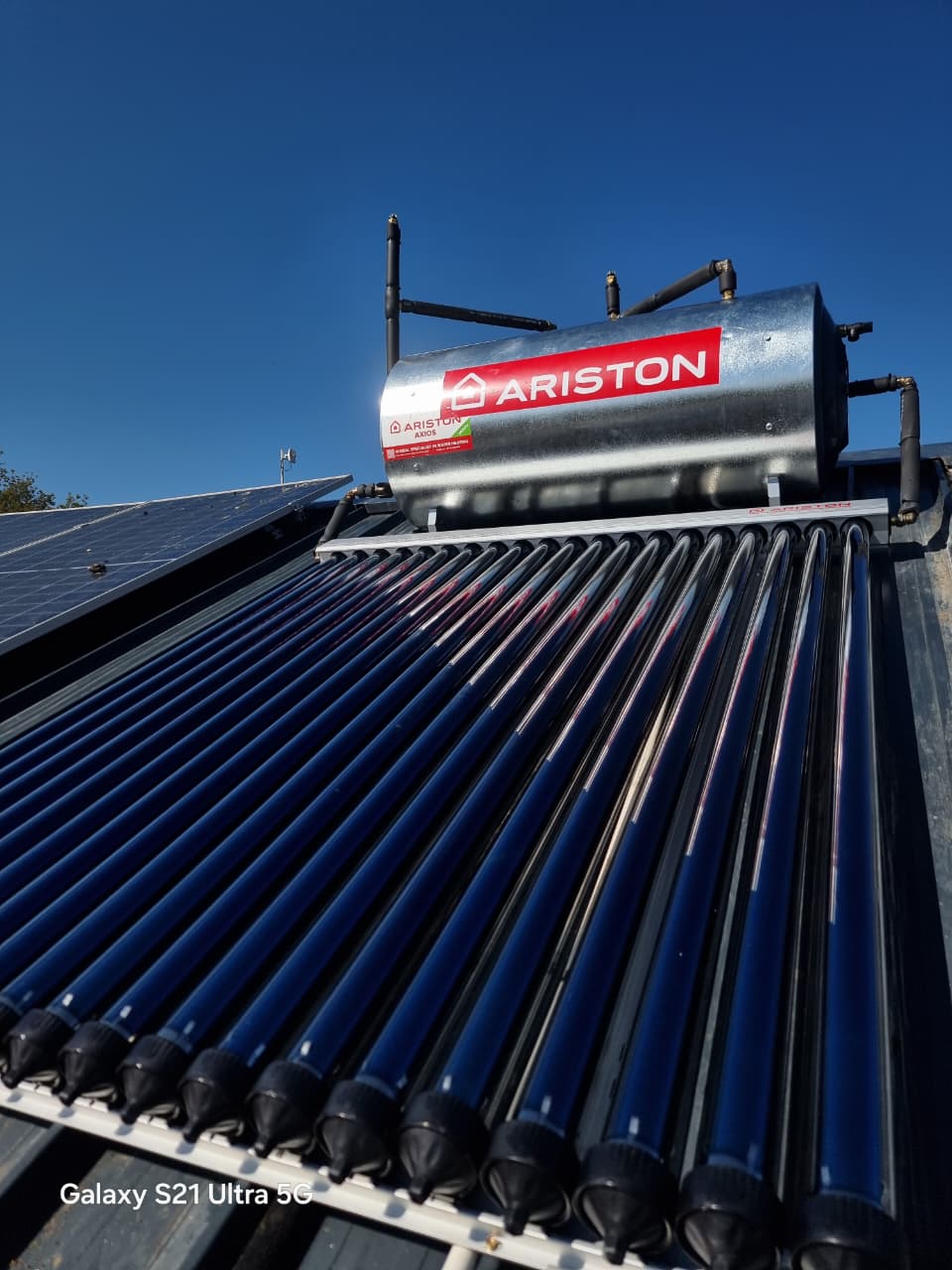 Solar geyser with evacuated tubes installed on a roof